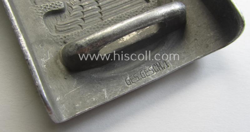 Aluminium-based, so-called: DRK (ie. 'Deutsches Rotes Kreuz'), enlisted-mens'- (ie. NCO-) type belt-buckle being a clearly maker- (ie. 'Ges.Gesch. 1'-) marked example