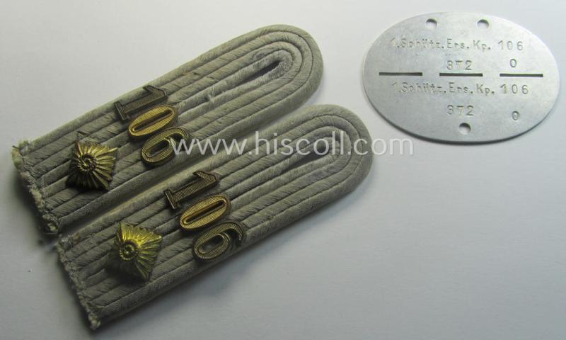 Unusual insignia-grouping comprising of a matching pair of WH (Heeres) officers'-type shoulderboards: 'Oberleutnant eines Inf.-Rgts.' that comes with its accompanying ID-disc (bearing the unit-designation: '1. Schütz.Ers.Kp. 106')