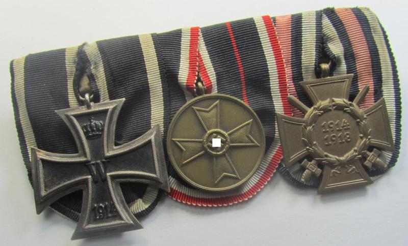 3-pieced 'WWI'- (ie. TR-) related medal-bar (ie. 'Ordenspange') resp. depicting a WWI-period: 'EK II.Kl.', a: 'KvK Medaille 1939' and a: 'FKK 1914-18 mit Schwn.'