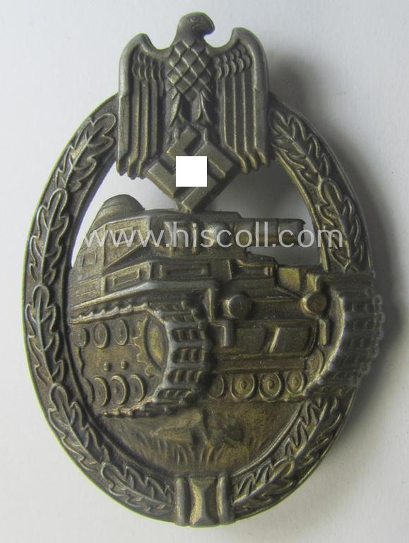 'Panzerkampfabzeichen in Bronze' (or: bronze-class panzer assault badge or PAB) being a neat (I deem) somewhat later-war-period zinc- (ie. 'Feinzink'-) version as was procuced by the: 'Frank u. Reif'-company