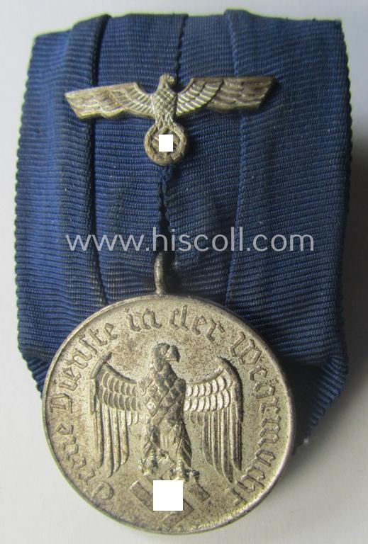 WH (Heeres- o. KM) so-called: 'Einzelspange' showing a: 'WH-Dienstauszeichnung 4. Stufe' (as was intended for 4 years of loyal-service) and that shows a detailed, 'Heeres'-type-eagle-device, period-attached