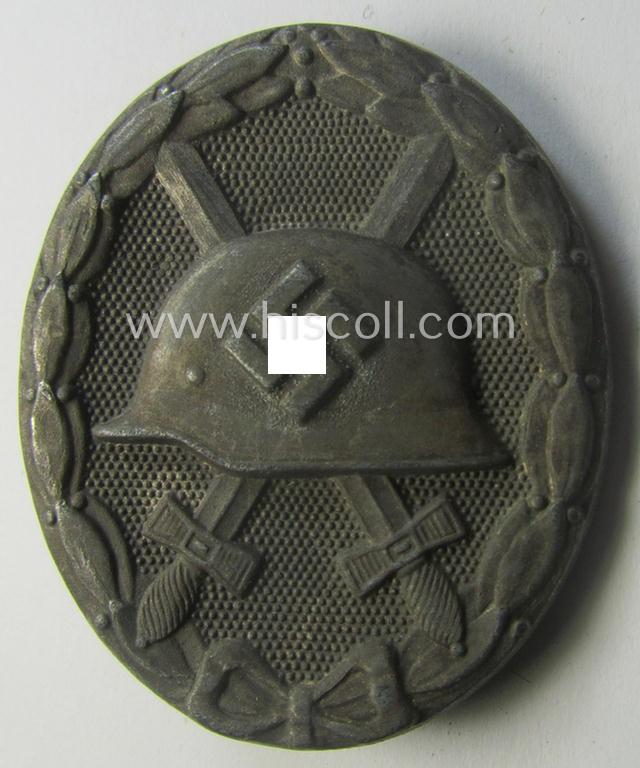 'Verwundeten-Abzeichen in Silber' (ie. silver-class wound-badge) being a maker- (ie. '4'-) marked example as was produced by the: 'Steinhauer u. Lück'-company