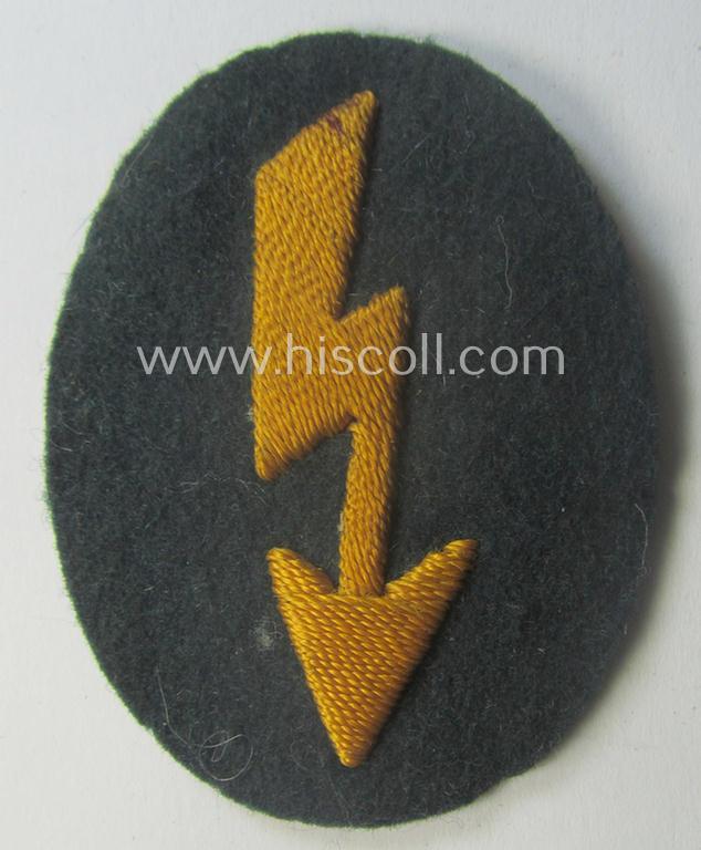 WH (Heeres) trade- and/or special-career insignia ie. hand-embroidered signal-blitz as executed in golden-yellow, as was intended for a soldier within the: 'Kavallerie- o. Aufklärungs-Truppen'