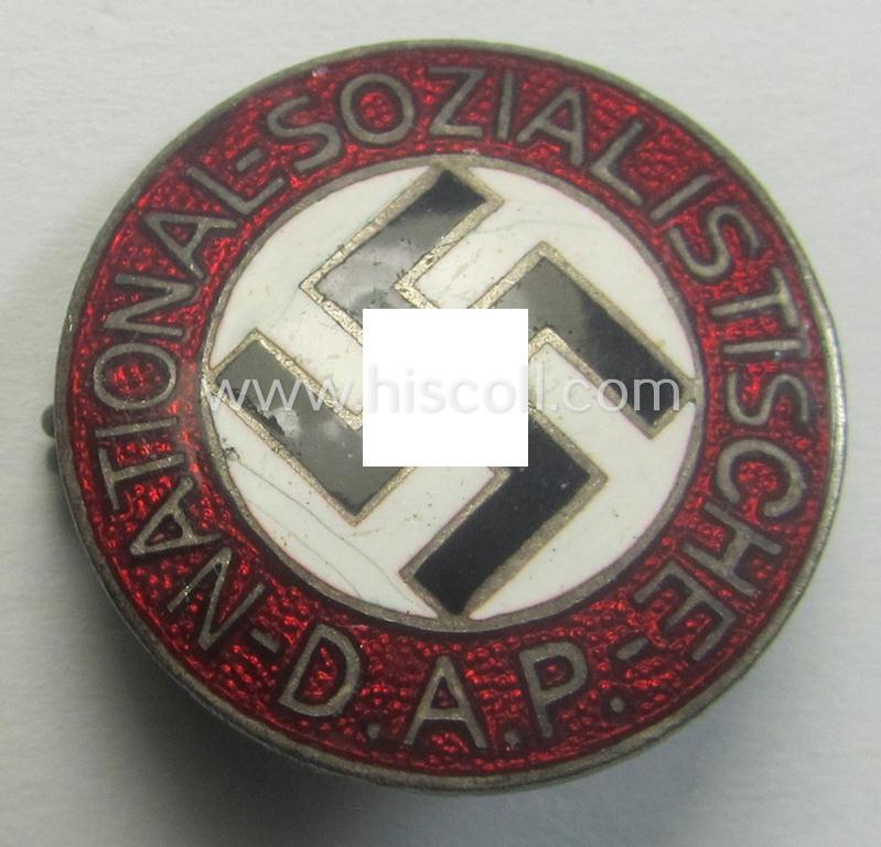 'N.S.D.A.P.'-membership-pin- ie. party-badge (or: 'Parteiabzeichen') which is maker-marked on its back with the makers'-designation: 'RzM' and/or: 'M1/34'