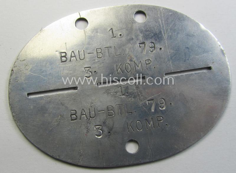Aluminium-based, WH (Heeres) ie. 'Pioniere- o. Bau-Truppen'-related ID-disc that shows the designation: 'Bau-Btl. 79 - 3. Komp.'