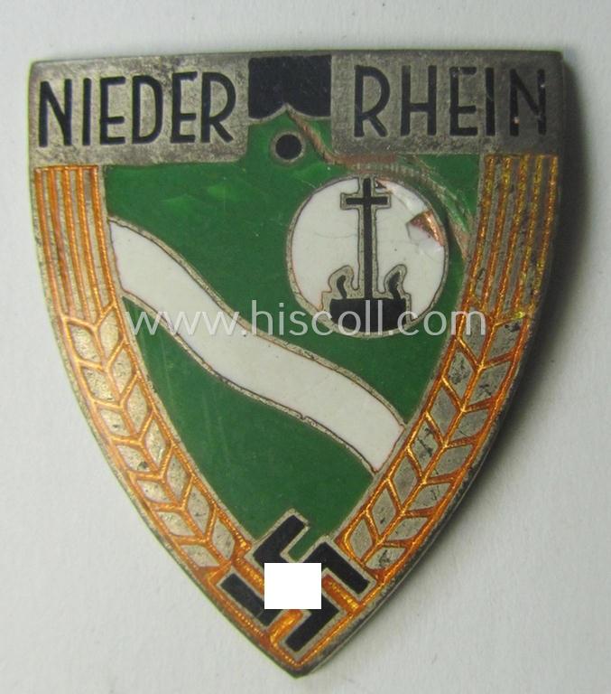 Minimally damaged, RAD (ie. 'Reichsarbeitsdienst') so-called: 'Traditions-Mützenabzeichen' as was specifically intended for a member who served within the: 'Arbeitsgau XXI' (= Niederrhein)