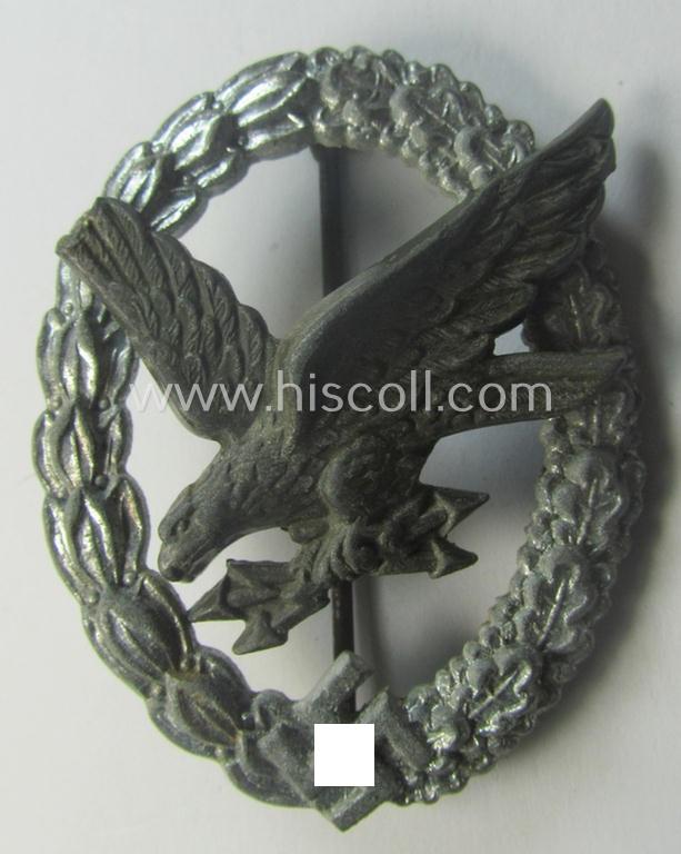 Damaged, WH (Luftwaffe) 'Fliegerschützen-Abzeichen mit Blitzbündel' being a neatly maker- (ie. 'B&N - L.'-) marked- and/or: typical zinc- (ie. 'Feinzink'-) based example as was produced by the: 'Berg & Nolte'-company