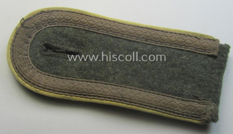 Single, mid-war-period, so-called: 'M43'-pattern, WH (Heeres) NCO-type shoulderstrap as piped in the bright-yellow-coloured branchcolour as was intended for usage by an: 'Uffz. der Nachrichten-Trpn.'