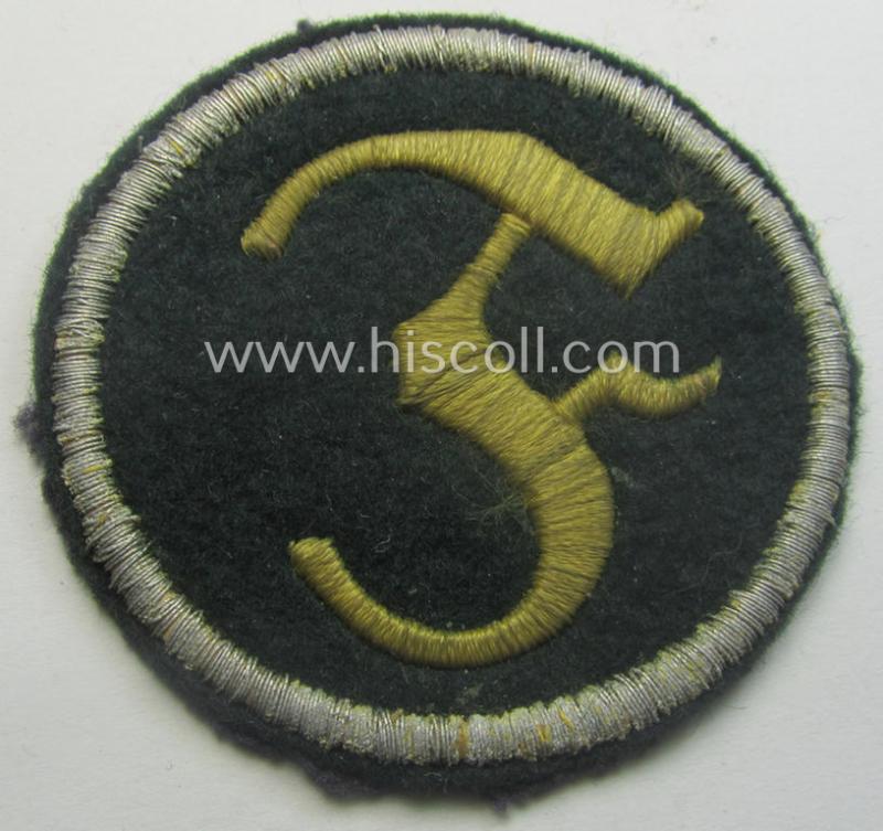 Truly used- and/or worn, WH (Heeres) machine-embroidered, trade- and/or special-career insignia (ie. 'Tätigkeitsabzeichen') as executed on a darker-green-coloured background as was intended for a: 'geprüfter Feuerwerker'