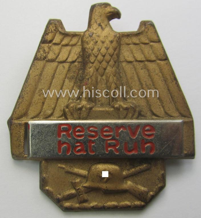 Commemorative, WHW- (ie. 'Winterhilfswerke'-) related 'tinnie' being a non-maker marked example depicting a 'Reichsadler' and showing a swastika and that is showing the text: 'Reserve hat Ruh'