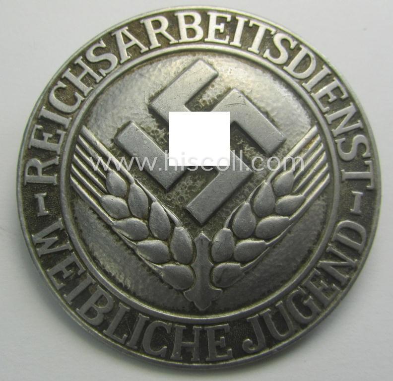 'Reichsarbeitsdienst der weiblichen Jugend' (or: RADwJ ie.: Womens Labor Service) so-called: 'Brosche für Arbeitsmaid' (or: membership-brooch) being a clearly maker- (ie. 'M.H.'-) marked and/or: '1937'-dated example