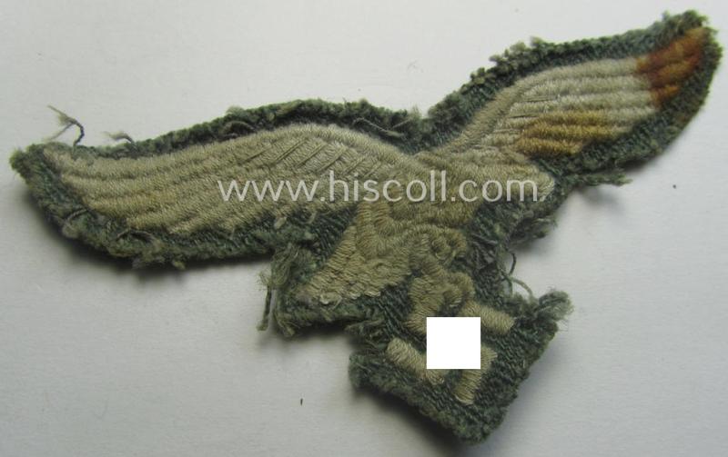 WH (Luftwaffe) machine-embroidered breast-eagle (ie. 'Brustadler für Mannschaften u. Unteroffiziere') being a clearly used example that comes mounted on a typical 'HBT'- (ie. 'Drillich'-) shaped- and/or linnen-based background