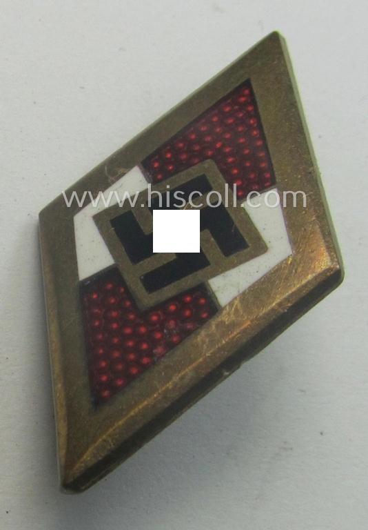 HJ (ie. 'Hitlerjugend') 'Goldenes Ehrenzeichen' being a serial- (ie. '9036'-) numbered example (that is clearly maker-marked on its back with the makers'-designation: 'RzM - M1/70' and/or: 'Ges.Gesch.'-patent-pending-designation)