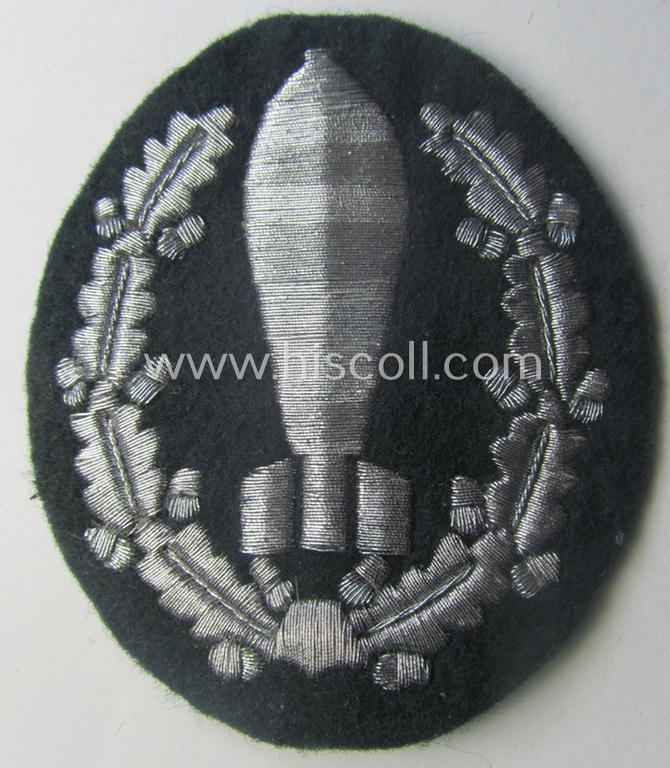Possibly unique - and truly luxuriously-styled! - WH (Heeres) 'Nebelwerfer Richtkannonier'- (or: qualified smoke-troops canon-operator) patch as executed in the neat 'machine-embroidered' so-called: 'flat-wire'-weave-pattern