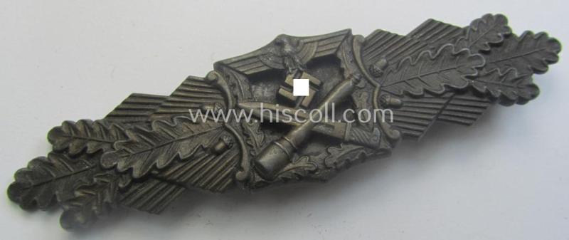 'Nahkampfspange in Bronze' (or: bronze-class close-combat clasp ie. CCC) being a neatly maker-marked- and/or minimally converse-shaped specimen as was produced by the: 'JFS'- (ie. 'Joseph Feix u. Söhne'-) company