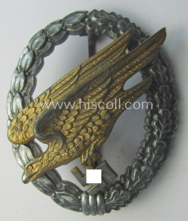 WH (Luftwaffe) 'Fallschirmschützen-Abzeichen' (or: paratroopers-jumpbadge) being a neatly maker- (ie. 'B&N - L'-) marked- and typical zinc- (ie. 'Feinzink'-) based example as was produced by the maker: 'Berg u. Nolte'