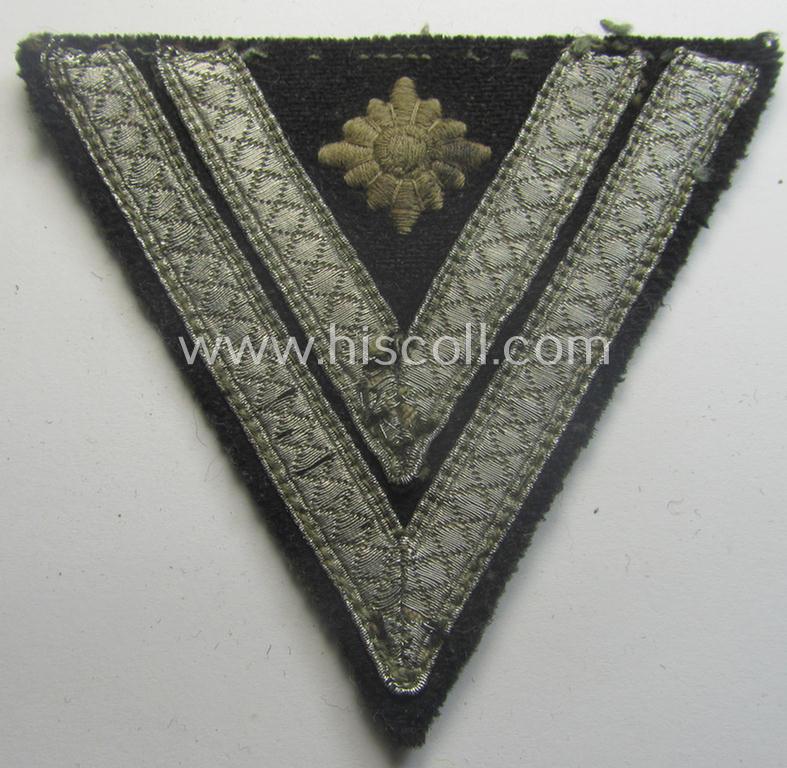 WH (Heeres) Pz-'Armwinkel' (or: rank-chevron) as intended for usage on the black-coloured 'Panzer'-type 'wrap-around'-tunics as was intended for usage by a soldier with the (unusually encountered!) rank of: 'Stabsgefreiter'
