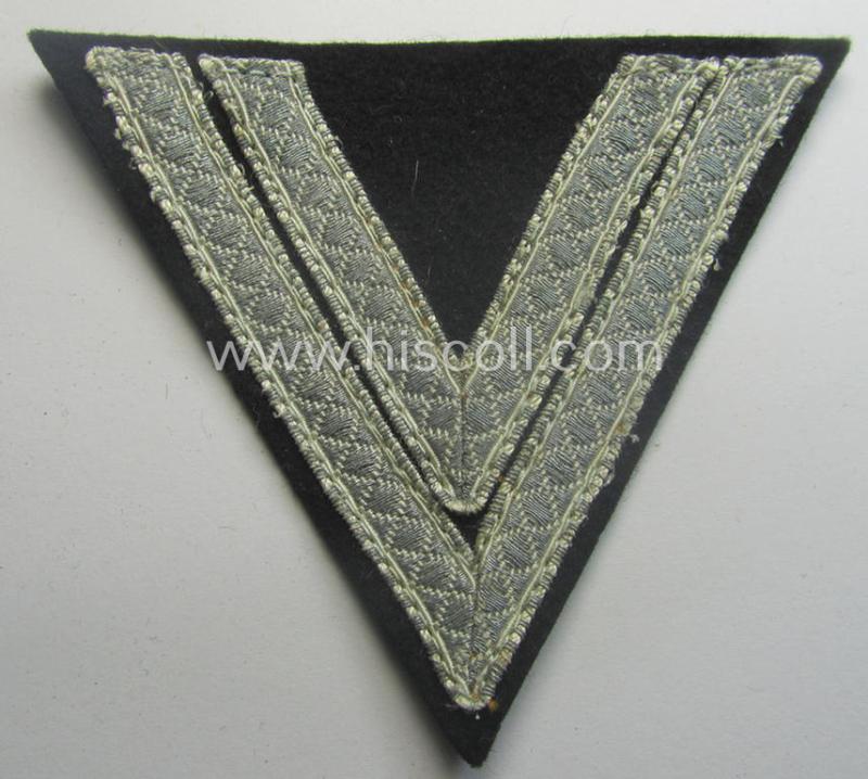 Waffen-SS- (ie. Heeres Panzer-) type 'Armwinkel' (or: rank-chevron) as executed on black-coloured wool as was intended for an: 'SS-Rottenführer' (ie. 'Obergefreiter')