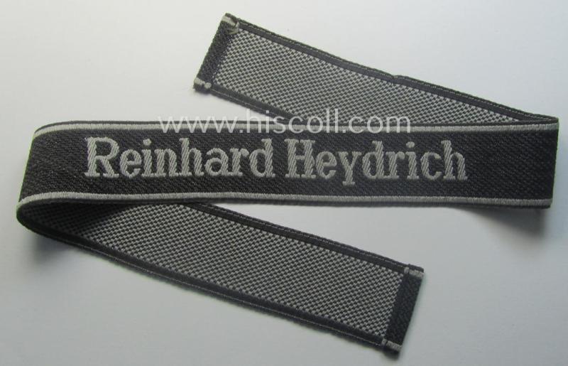 Waffen-SS, 1943-pattern cuff-title (ie. 'Ärmelstreifen') depicting the machine-woven Latin script text in silver-grey linnen as was intended for a member of the: 'SS-Geb.Jäg.-Rgts. 6. (u.11.)': 