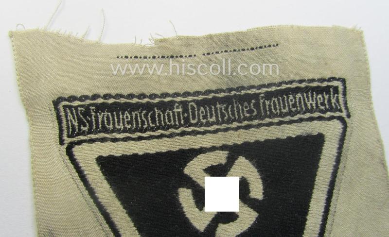 Linnen-based sport-shirt badge as was specifically intended for usage by members serving within the: 'Deutches Frauenwerk' (or: 'DFW') being a 'virtually mint' example