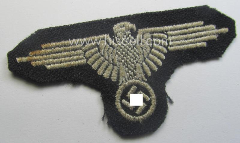 Mid- (ie. later-war-) pattern, 'SS' (ie. 'Waffen-SS') so-called: 'RzM-style' enlisted-mens'-/ie. NCO-pattern arm-eagle as was intended for usage by the various Waffen-SS troops throughout the war