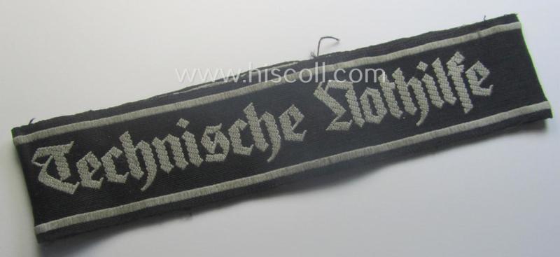 Truly used and carefully tunic-removed, TeNo-cuff-title (ie. 'Ärmelstreifen') entitled: 'Technische Nothilfe' (= 'TeNo'), being an example as was woven in the neat 'BeVo'-weave pattern