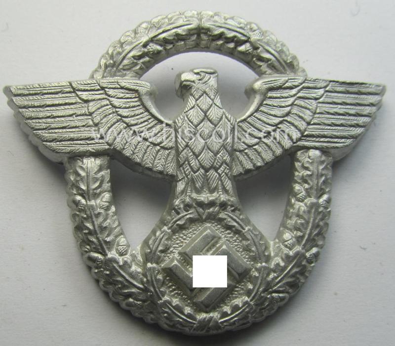 'Standard-issue'-pattern - and typical aluminium-based - 'Polizei'- (ie. police) visor-cap eagle being a bright-silver-coloured- and maker- (ie. 'G.W. 41'-) marked example as was intended for usage on the various 'Polizei' (ie. police) visor-caps