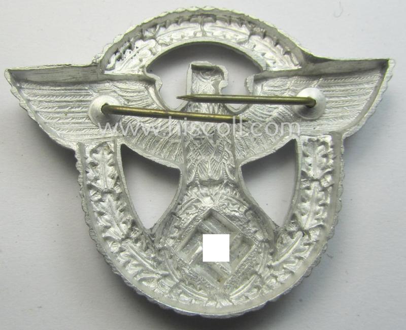 'Standard-issue'-pattern - and typical aluminium-based - 'Polizei'- (ie. police) visor-cap eagle being a bright-silver-coloured- and maker- (ie. 'G.W. 41'-) marked example as was intended for usage on the various 'Polizei' (ie. police) visor-caps