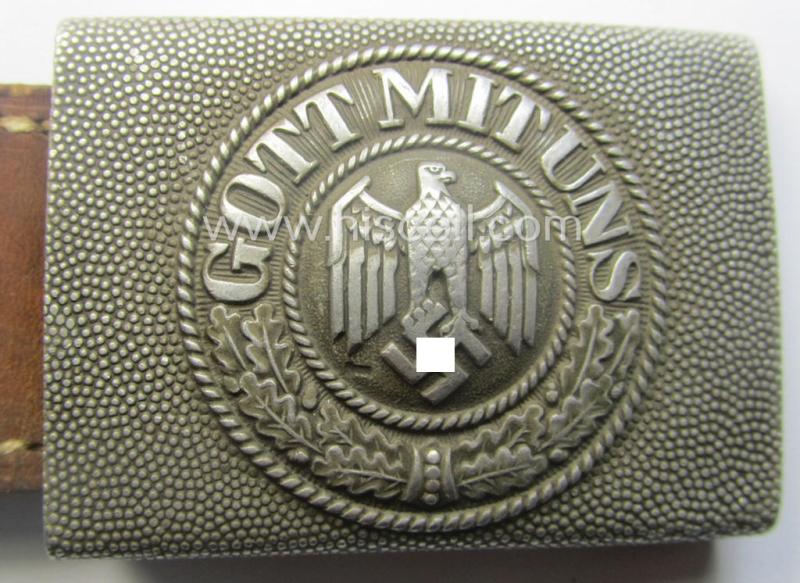 WH (Heeres) 'standard-pattern', field-grey-toned- and aluminium-based belt-buckle being a maker- (ie. 'Paulmann & Crone'-) marked- and/or: '1938'-dated example that comes mounted onto its leather-based tab