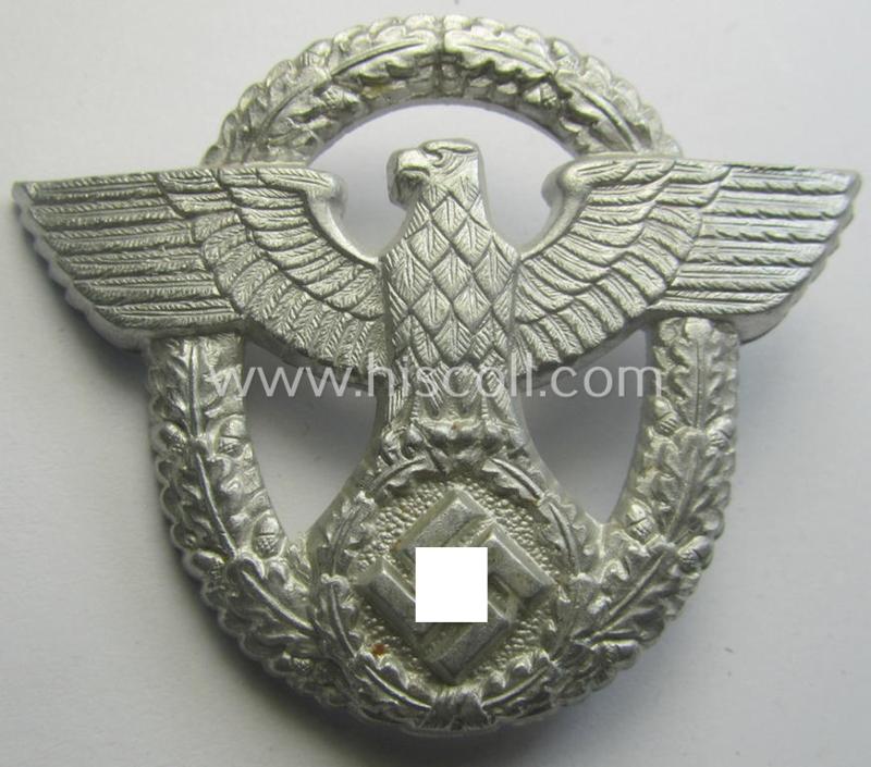 'Standard-issue'-pattern - and typical aluminium-based - 'Polizei'- (ie. police) visor-cap eagle being a bright-silver-coloured- and maker- (ie. 'G.W. 41'-) marked example as was intended for usage on the various 'Polizei' (ie. police) visor-caps