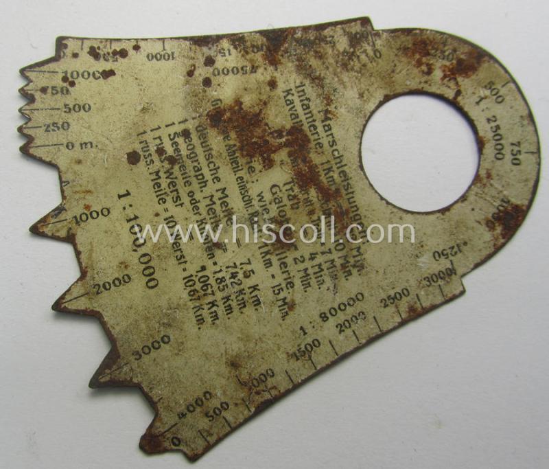 WWII-period, WH 'Marschabstände- o. Winkel-Messgerät' being an example as executed in beige-white-coloured- and/or tin-based material as was (presumably) produced by the: 'Esero'-company