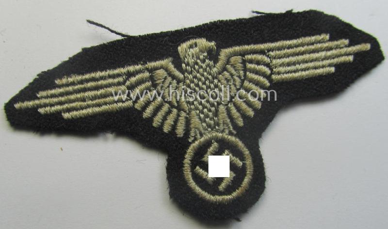 Mid- (ie. later-war-) pattern, 'SS' (ie. 'Waffen-SS') so-called: 'RzM-style' enlisted-mens'-/ie. NCO-pattern arm-eagle as was intended for usage by the various Waffen-SS troops throughout the war