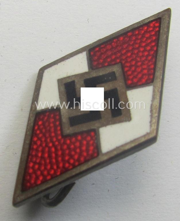 Early-pattern, HJ (ie. 'Hitlerjugend') enamelled lapel-pin (ie.: 'Raute') being a darker-red-coloured example that is void of an 'RzM'-makers'-designation (but that does show a: 'Ges.Gesch.'-patent-pending-designation)