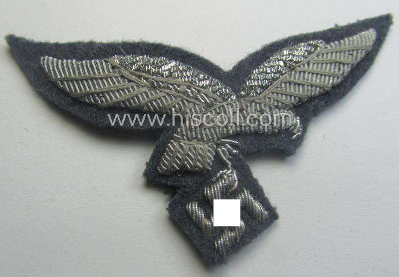 WH (Luftwaffe) officers'-pattern visor-cap-eagle (ie. 'Adler für LW-Offiziers-Schirmmütze') being a neatly hand-embroidered example of the: 'Extra Qualität' that comes in a 'virtually mint ie. unissued'-), condition