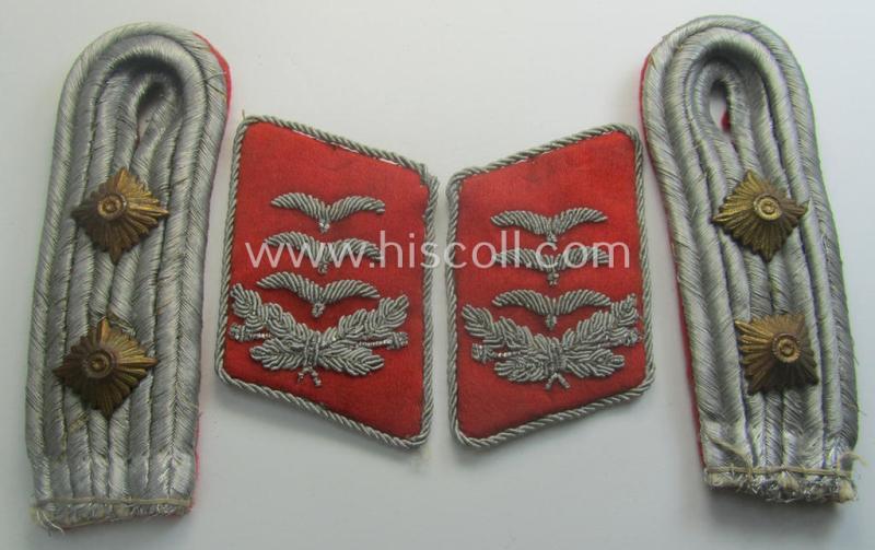 Truly used- and/or worn, four-pieced, WH (LW) insignia-set comprising of a pair of hand-embroidered, WH (Luftwaffe) officers'-type collar-patches and dito shoulderboards: 'Hauptmann der Flak-Artillerie-Trpn.'