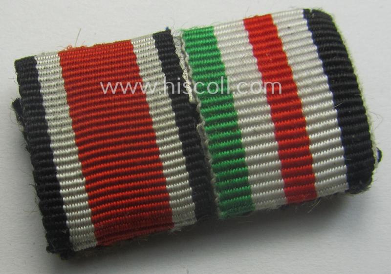 Two-pieced ribbon-bar (ie. 'Band- o. Feldspange') showing resp. the ribbons for an: 'EKII. Klasse' and a: 'Deutsch-Italienische Feldzugsmedaille'