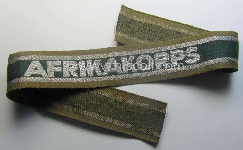'BeVo'-like cuff-title (ie. 'Ärmelstreifen') entitled: 'Afrikakorps' being a presumably issued but simply never worn example that comes in an overall very nice- (ie. non-shortened- and never tunic-attached-), condition