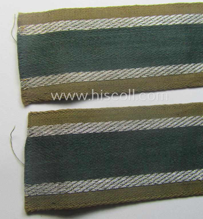 'BeVo'-like cuff-title (ie. 'Ärmelstreifen') entitled: 'Afrikakorps' being a presumably issued but simply never worn example that comes in an overall very nice- (ie. non-shortened- and never tunic-attached-), condition