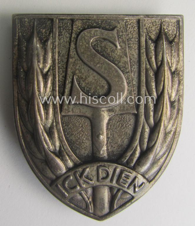 Dutch WWII-period, labour service ie. 'Nederlandse Arbeidsdienst' (or: NAD) sports'-badge entitled: 'Ick Dien' being an example that is executed in silver-coloured metal