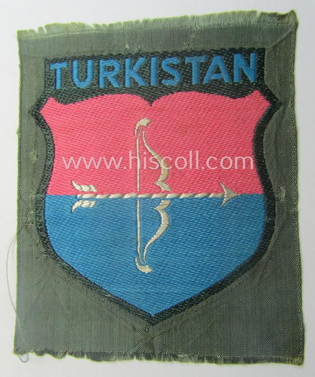 'BeVo'-type armshield entitled: 'Turkistan' (being of the scarcely encountered third and/or final pattern!) that was intended for a volunteer who served within the: 'Deutsche Wehrmacht' ie. within the: 'Turkistanisches Legion'