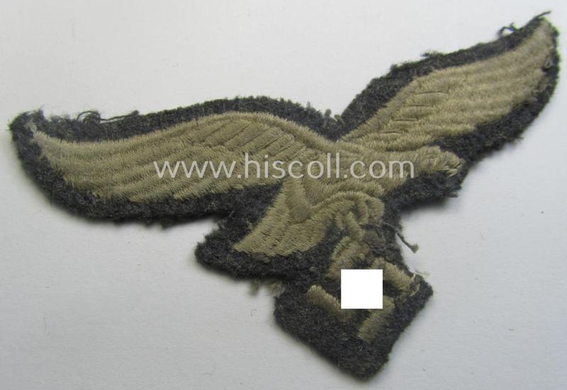 WH (Luftwaffe) EM- (ie. eventually NCO-) type breasteagle (being a once tunic-attached example as executed in typical machine-embroidered-pattern)
