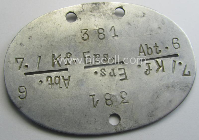 Aluminium-based, WH (Heeres-) transport ie. 'Nachshub'-related ID-disc, bearing the clearly stamped unit-designation: '7./Kf.Ers.Abt. 6'