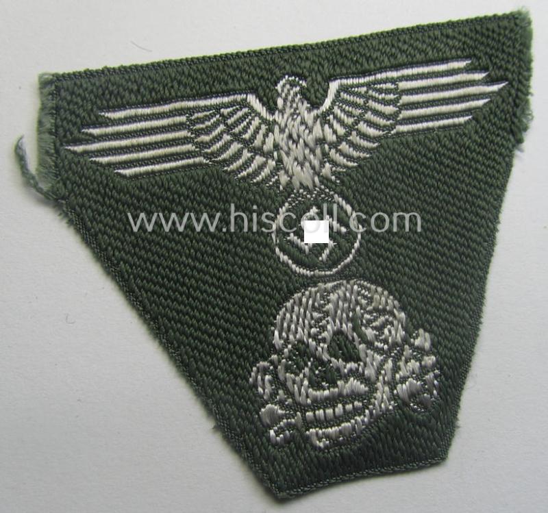 Waffen-SS field-grey-coloured, M43-pattern cap-trapezoid as was intended for usage on the M43-model field-caps (ie. 'Einheitsfeldmützen') that comes in an overall nice- (albeit minimally damaged-), condition