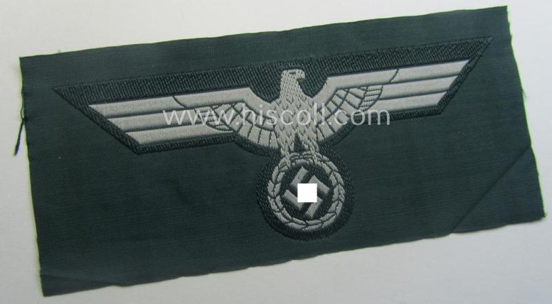 WH (Heeres) early- (ie. pre-war-) period- and/or greyish-coloured breast-eagle of the: 'M36'- (ie. 'M40'-) pattern as was executed in the 'BeVo'-weave pattern on a darker-green-coloured background