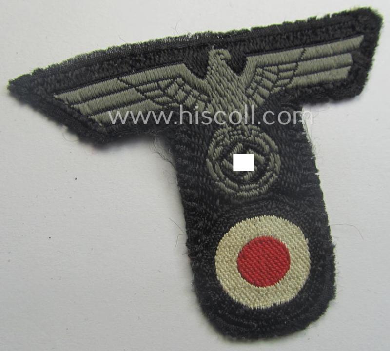 WH (Heeres) 'Panzer'-related, 'T-shaped' ie. 'M42'-pattern cap-eagle/cocarde as executed in 'BeVo'-weave pattern (being a minimally stained example that comes in a clearly used- ie. once cap-attached, condition)