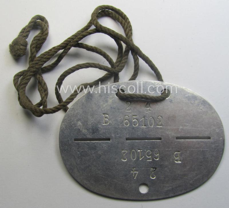Aluminium-based, WH (LW) ie. 'Flieger o. Kampfgeschwader'-related ID-disc bearing the clearly stamped- and/or: 'coded'-unit- ie. 'MOB'-designation that reads: '65102' (and as such belonging to the: '3./KG 51')