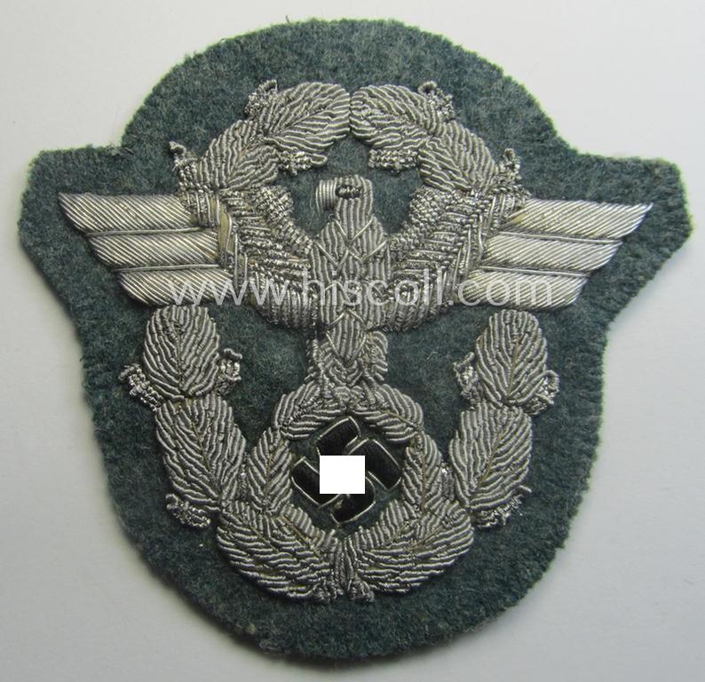 Truly used - and neatly hand-embroidered! - example of an officers'-pattern so-called: 'Polizei' (ie. police) arm-eagle (as executed in silver-toned braid!) and that comes in a moderately used- and/or worn, condition