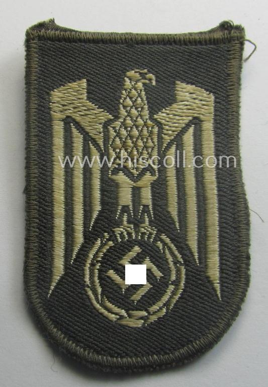 German Red Cross ('DRK' or: 'Deutsches Rotes Kreuz') tunic eagle-device (ie. 'Ärmeladler') as executed in 'BeVo'-weave-pattern