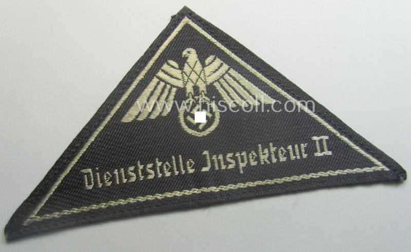 German Red Cross (ie. 'Deutsches Rotes Kreuz' or 'DRK') greyish-coloured- and/or (typically) triangular-shaped arm-eagle entitled: 'Dienststelle Inspekteur II' as was executed in the neat 'BeVo'-weave pattern