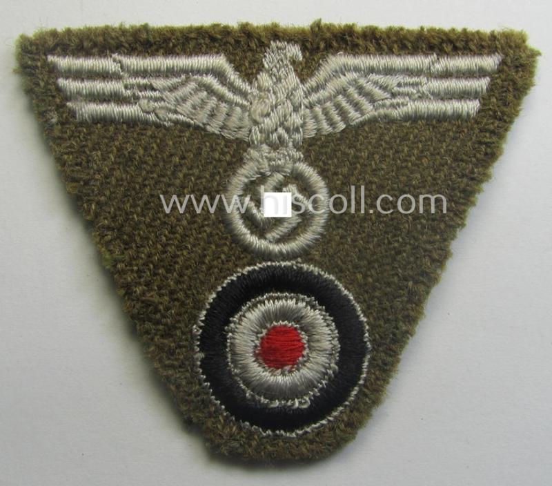 'Foreign-produced' (!) OT- (ie. 'Organisation Todt'-) related, so-called: 'M43-pattern'-cap-trapezoid (ie. 'Mützentrapez') as executed in machine-embroidered pattern onto a typical greenish-/brown-coloured- and/or woolen-based background